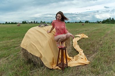 Diana naked on a hay stack from Fame Girls